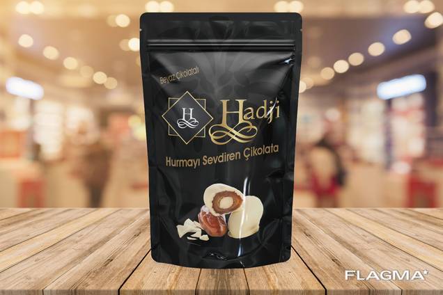 "Hadji" chocolate dates with almonds