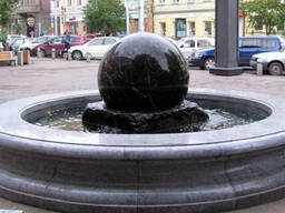 Ball fountain floating made of stone.